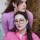 Gorgeous young woman wearing the Beth earrings in beige with a radiant brass element by the brand Dress To Finesse. The other girl on the right is wearing the Elisabeth earrings in royal blue. This brand is created by Anna De Ceulaer in Antwerp, Belgium. The Beth earrings are made of clay and are very lightweight.